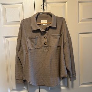 American eagle button up top.